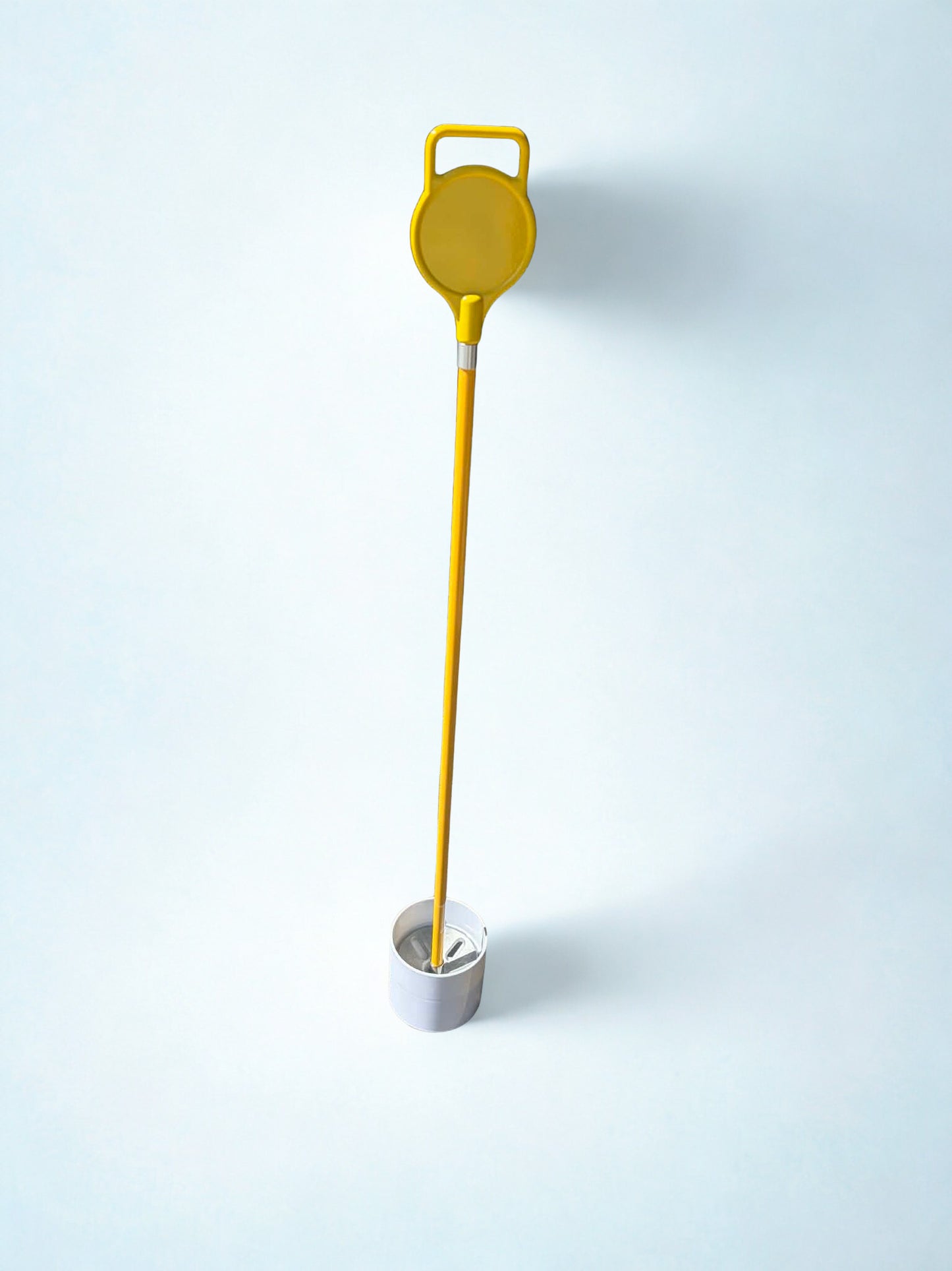 Golf junior flag set includes cups and flag with ball catcher